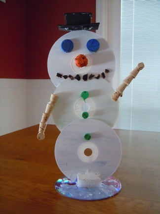 make a snowman from recycled cds